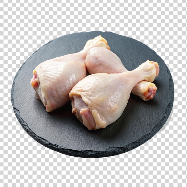 Pattes De Poulet Crues Sur Une Plaque D'ardoise Noire Isolée Sur Un Fond Transparent