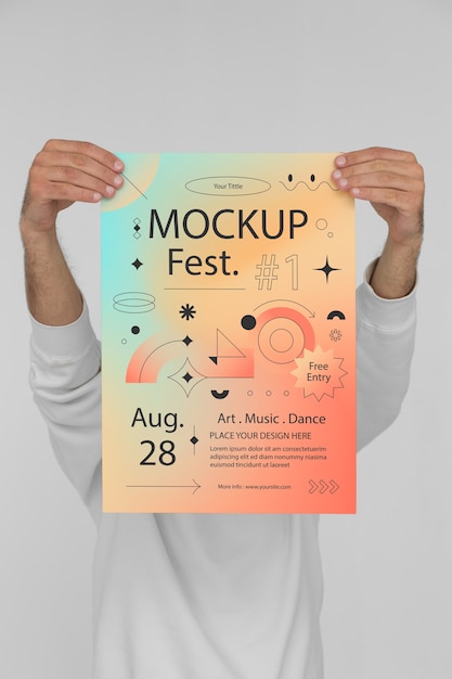 Person, die ein Poster mit Farbverlauf für das Festival hält