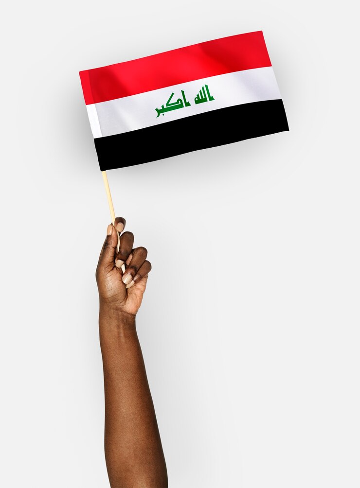 PSD person waving the flag of republic of iraq