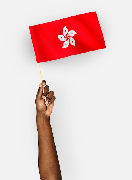 Personne agitant le drapeau de Hong Kong