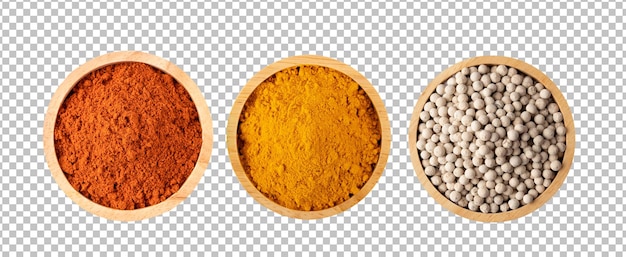 PSD piment rouge broyé poudre de curcuma poivre dans un bol en bois