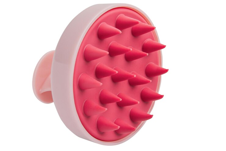 PSD pincel de masaje de silicona para lavar el cabello sobre un fondo vacío