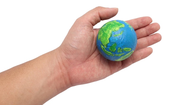Planète peinte terre globe tenu dans la main découpé isolé