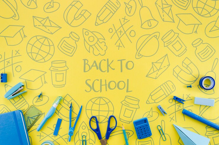 PSD plat lay retour à l'école avec fond jaune