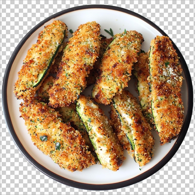 un plato blanco con alas de pollo y un recipiente blanco con un fondo transparente