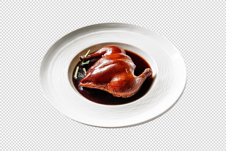 Un plato de delicioso pato de Pekín en un fondo transparente