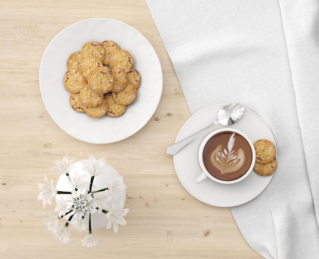 plato de galletas y chocolate caliente con florero vista superior