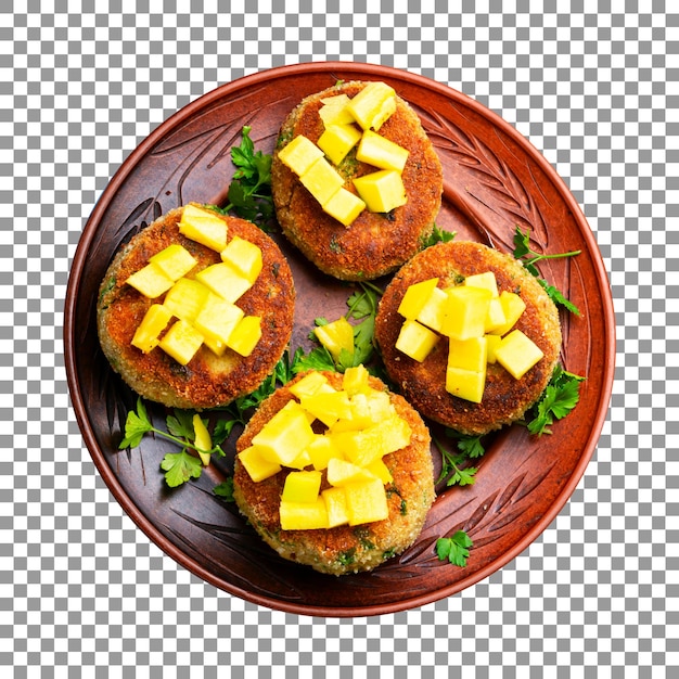 Plato de hamburguesas de quinua con mango sobre fondo transparente