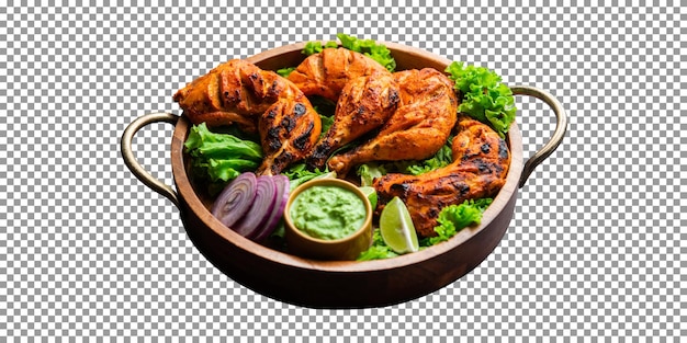 Pollo tandoori con salsa verde y verduras sobre fondo transparente