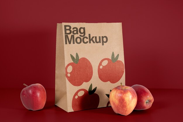 Pommes avec maquette de sac en papier