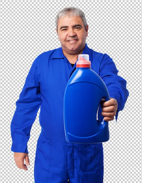 Porträt eines Mechanikers mit einer Ölflasche