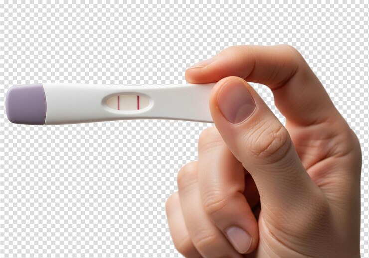 PSD positive pregnancy test held in hand motherhood concept home test family planning