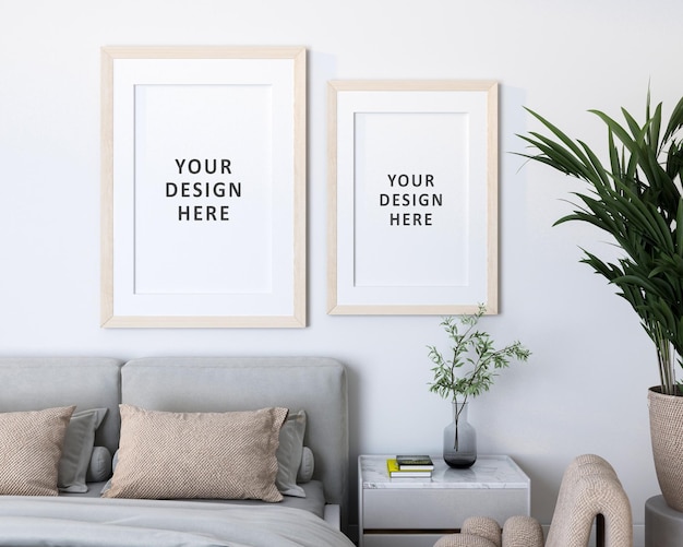 Póster en la habitación de cama de pared blanca vacía