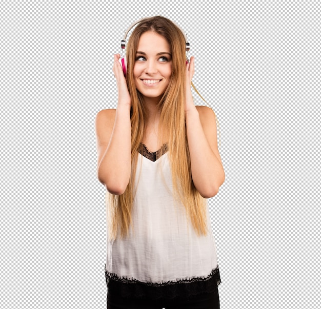 pretty young woman listening music on headphones
