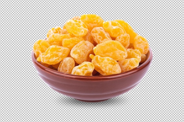 Prunes jaunes sèches dans un bol