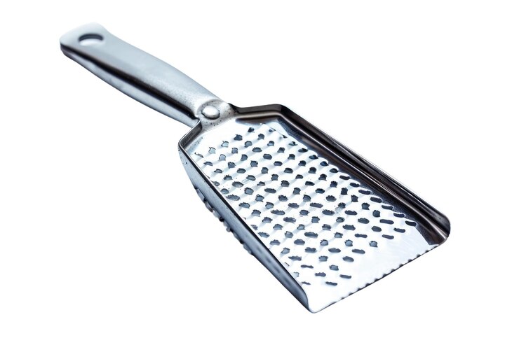 PSD rastreador de mano de metal aislado sobre fondo blanco foto de utensilios de cocina de estudio aig57