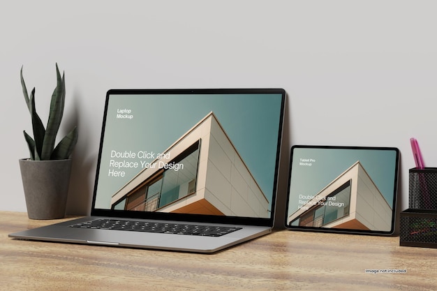 Realistischer laptop mit tablet pro mockup