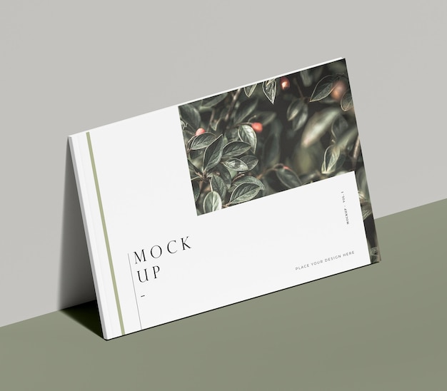 Rivista editoriale mock-up con la natura appoggiata a un muro