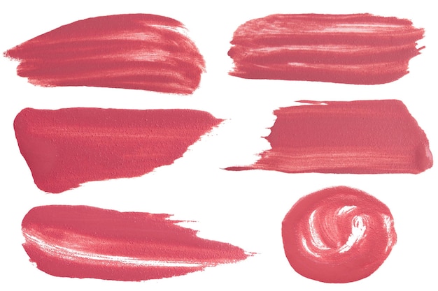 Un rouge à lèvres liquide rose mat sur un fond vide