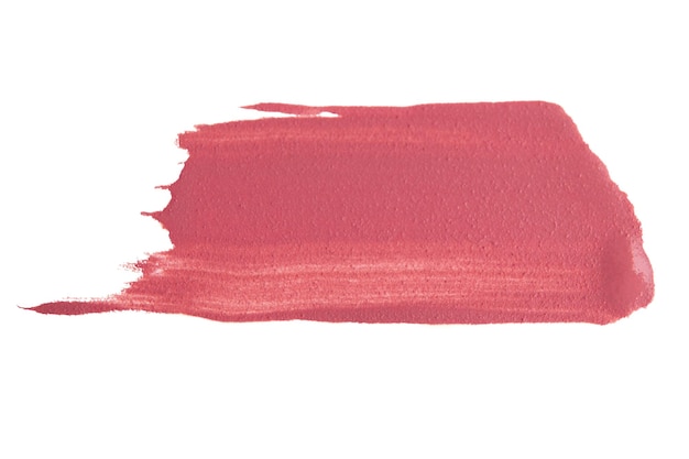 Un rouge à lèvres liquide rose mat sur un fond vide