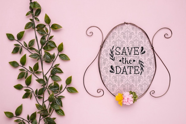 Salva la data mock-up cornice vintage con fiori e foglie