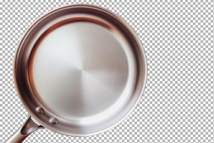 PSD sartén de acero inoxidable con superficie lisa utilizada para cocinar varios platos en un entorno de cocina
