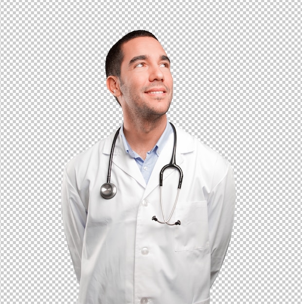 Satisfeito jovem médico posando