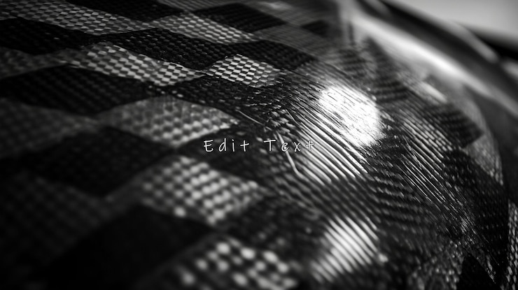 PSD scatto monocromatico di primo piano di una superficie a modello tessuto con luci riflettenti
