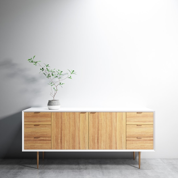 Schrank mit Lampe und Pflanze darauf