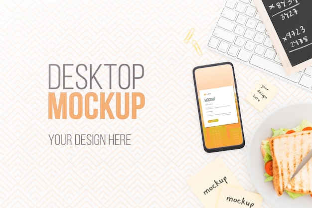Scrivania vista dall'alto con telefono mock-up e sandwich