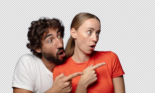 se sentant choqué et surpris pointant et regardant vers le haut dans la crainte avec un regard étonné bouche ouverte