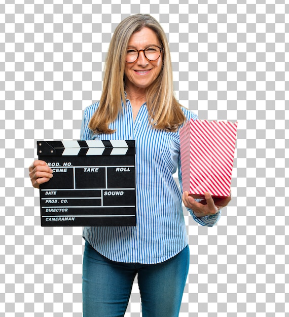 Senior mujer hermosa con una claqueta de cine