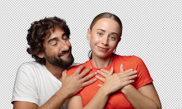 sentirsi romantici felici e innamorati sorridendo allegramente e tenendosi per mano vicino al cuore