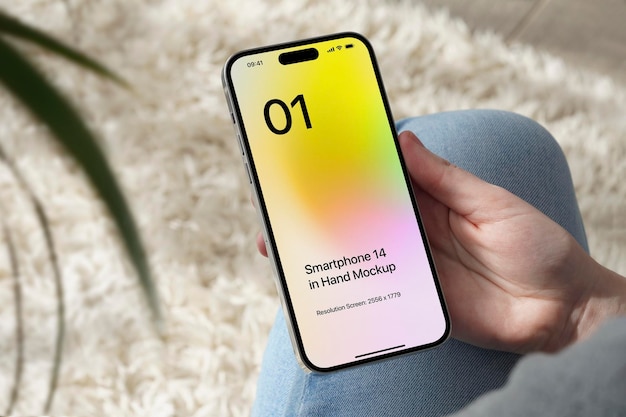 Smartphone 14 im handmodell mit modernem teppichhintergrund