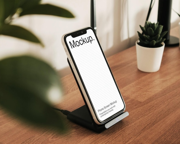 Smartphone-mockup auf einem holztisch