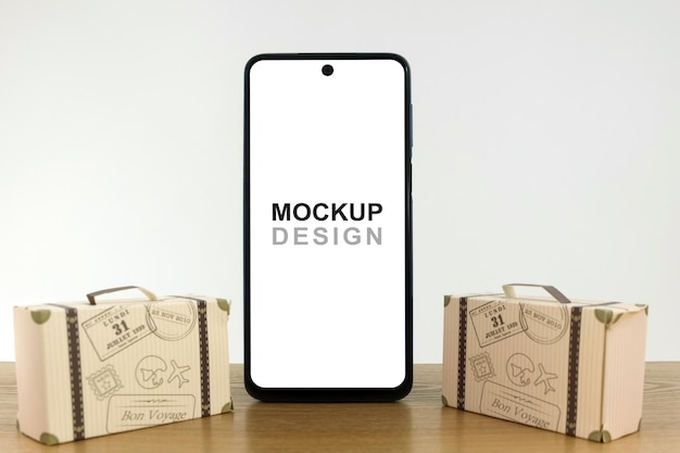 PSD smartphone mockup com malas de viagem