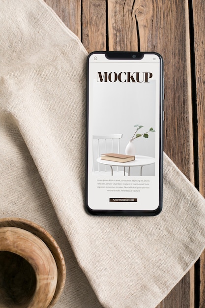 PSD smartphone vue de dessus sur table en bois