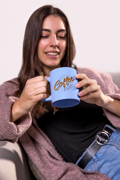 PSD smiley woman holding mug