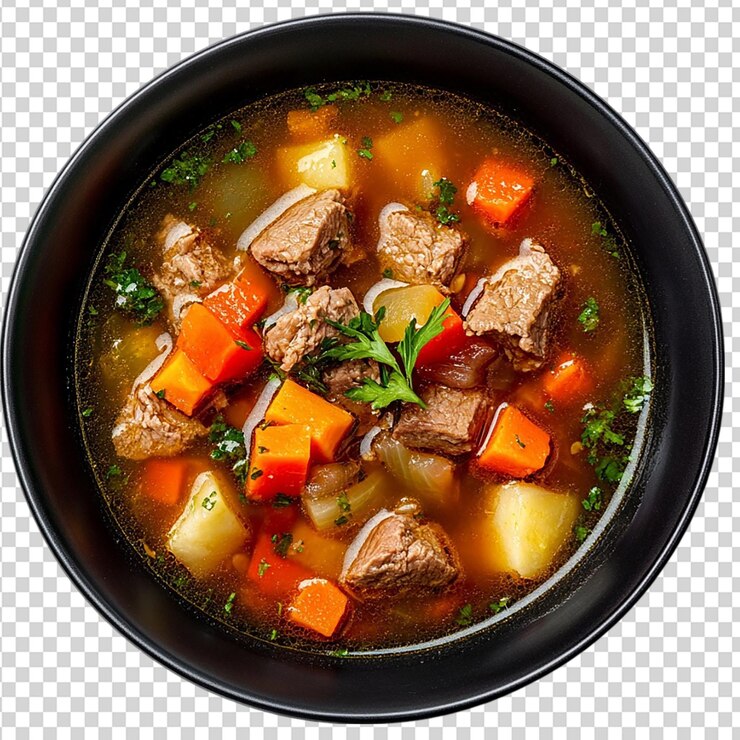 PSD sopa con carne y verduras en un plato negro vista superior aislada sobre un fondo transparente