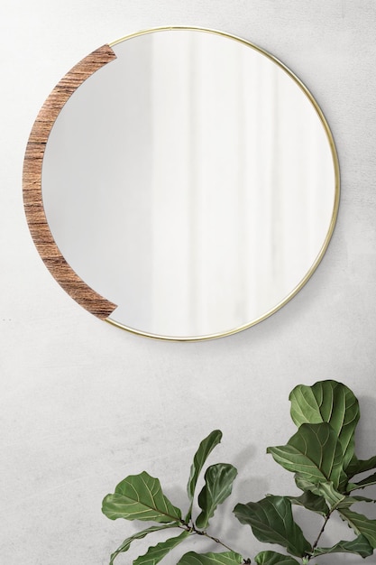 Specchio circolare con fondale in legno con mockup di fichi a foglia di violino