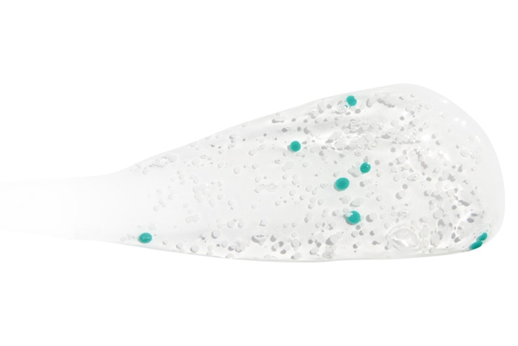 PSD spruzzare gel trasparente con granuli blu siero trasparente su sfondo bianco png