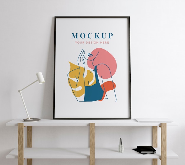 Stanza dell'artista con attrezzatura e mockup di poster