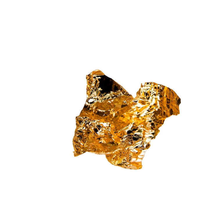 PSD stücke goldfolie auf einem leeren hintergrund