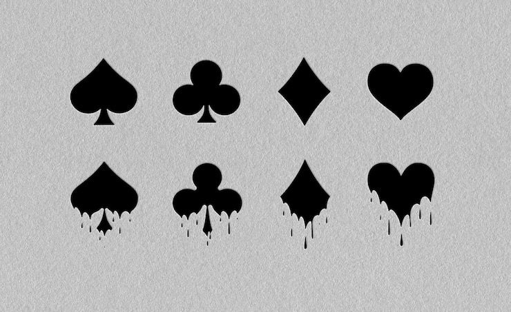 PSD suites de cartas de juego negras abstractas con efecto de goteo en un fondo gris texturizado