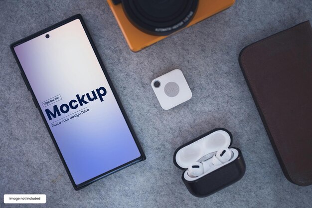 un teléfono está en el suelo al lado de un caso de Kleenex mock up