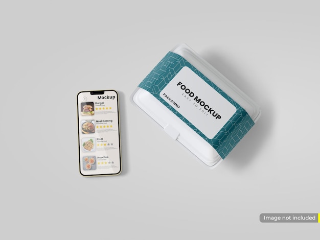 Téléphone avec maquette de boîtes à nourriture