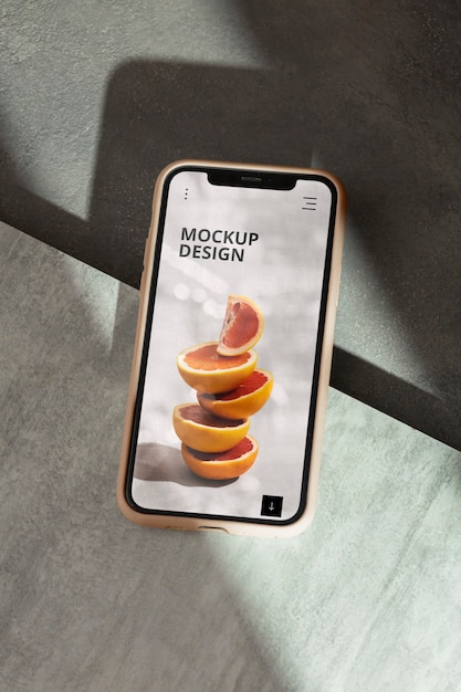 Téléphone sur mur de béton avec ombre