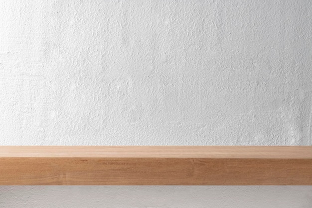 El telón de fondo del producto psd modelo de pared vacía mesa de madera