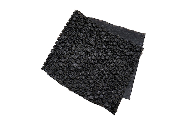 Textura de envoltura de burbujas negra plegada aislada sobre fondo blanco