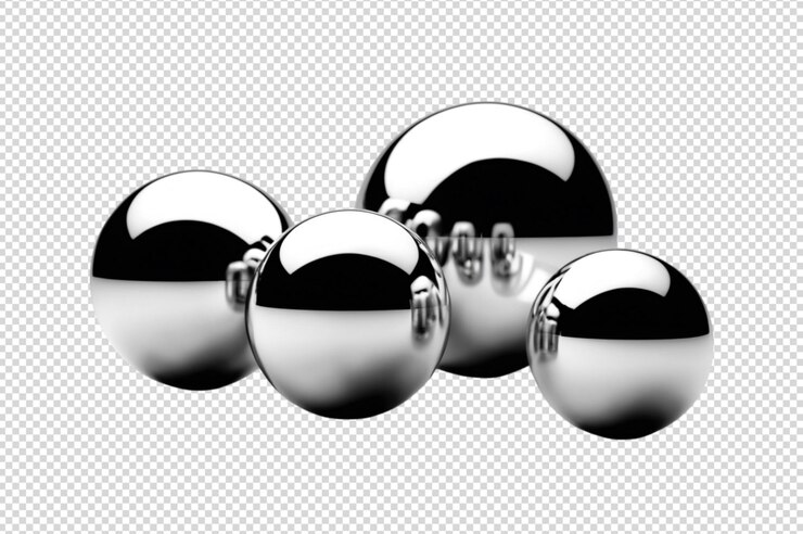 Three reflective metallic spheres gleam under light
